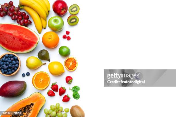 multicolored fruits border on white background - apple fruit white background stock pictures, royalty-free photos & images