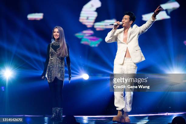 Jolin Tsai performs with singer Eric Chou（Hsing Che Chou）on stage during 'Ugly Beauty World Tour Concert' on April 26, 2021 in Taipei, Taiwan.