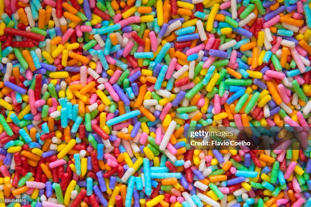 Colorful sugar sprinkles filling the frame