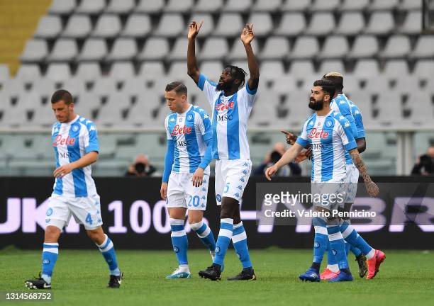 Tiemoue Bakayoko of SSC Napoli celebrates with teammates after scoring their team's first goal during the Serie A match between Torino FC and SSC...