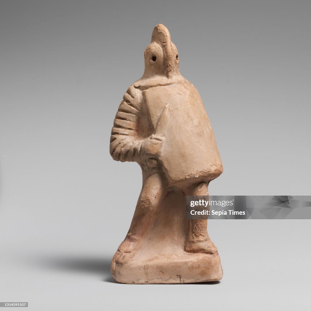 Terracotta statuette of a gladiator, Imperial, 1st–2nd century A.D., Roman, Terracotta, Overall: 6 1/4 x 2 3/4 x 1 7/8 in. (15.9 x 6.9 x 4.8 cm), Terracottas, The gladiator wears protective body armor and carries a shield and short sword. He can be ident