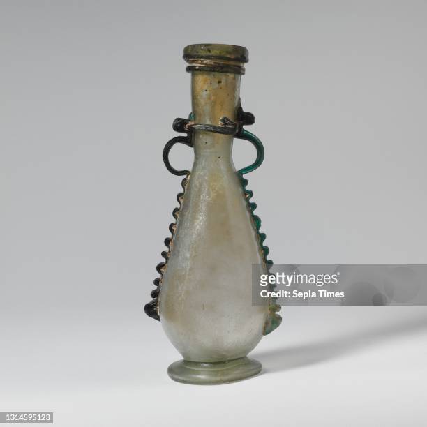 Glass bottle, Late Imperial, 4th–5th century A.D., Roman, Syrian, Glass; blown, trailed, and tooled, H. 6 1/4 in. , Glass, Translucent blue green;...