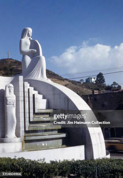 35mm film photo shows the muse of Music, Dance, Drama statuary at the entrance to the Hollywood Bowl concert venue in Los Angeles, built by Lloyd...