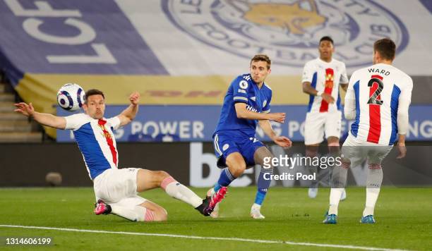 Timothy Castagne of Leicester City scores their team's first goal past Scott Dann of Crystal Palace during the Premier League match between Leicester...