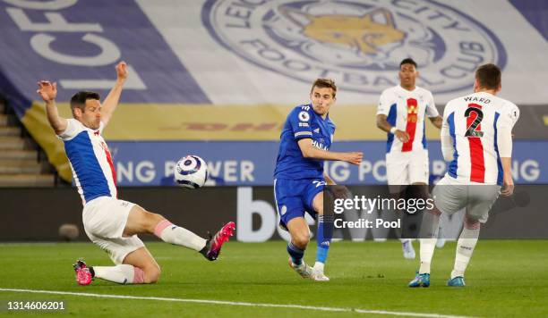 Timothy Castagne of Leicester City scores their team's first goal past Scott Dann of Crystal Palace during the Premier League match between Leicester...