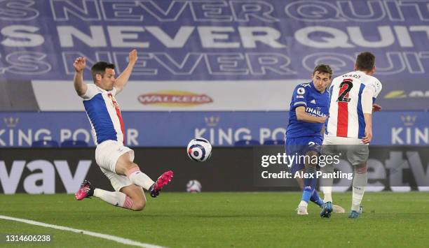 Timothy Castagne of Leicester City scores their team's first goal past Scott Dann of Crystal Palace during the Premier League match between Leicester...