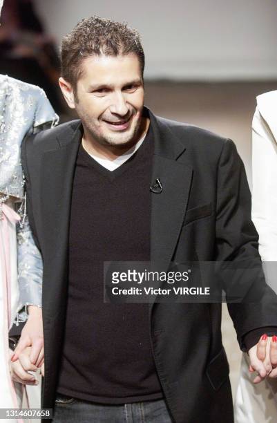 Fashion designer Pascal Millet walks the runway during the Carven Haute Couture Spring/Summer 2004 fashion show as part of the Paris Haute Couture...