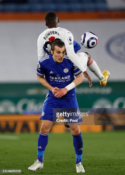 Caglar Soyuncu of Leicester City battles for possession with Christian Benteke of Crystal Palace during the Premier League match between Leicester...