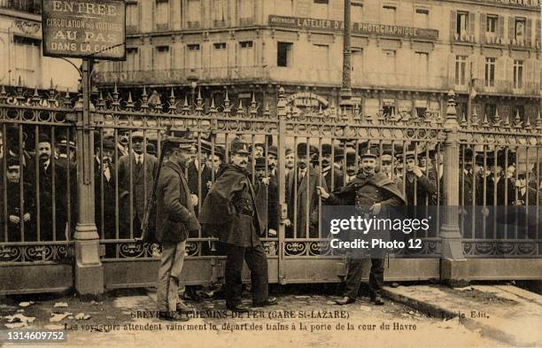 Strike of the railway workers at the Paris Gare Saint-Lazare in 1910. Vintage postcard.