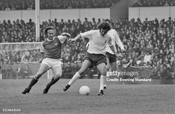 Footballers George Armstrong of Arsenal and Chris McGrath of Tottenham Hotspur during a League Division One match at White Hart Lane in London, UK,...