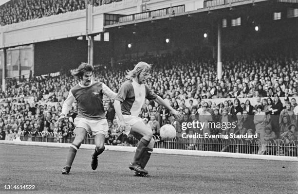 Footballers Brian Chambers of Arsenal and Kenny Burns of Birmingham City during a League Division One match at Highbury Stadium in London, UK, 6th...