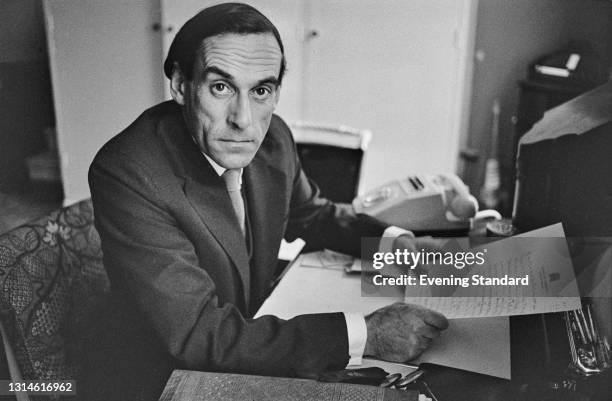 British Liberal Party leader Jeremy Thorpe reading a letter with a House of Commons letterhead during the UK general election campaign, UK, 18th...