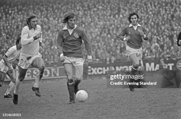 English footballers Stan Bowles and Gerry Francis of Queens Park Rangers during an FA Cup quarter-final match against Leicester City at Loftus Road,...