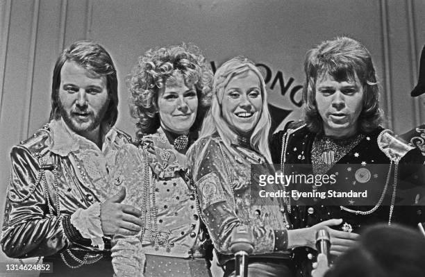 Swedish pop group ABBA win the 1974 Eurovision Song Contest at the Dome in Brighton, with their song 'Waterloo', UK, 6th April 1974. From left to...