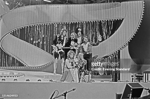 Swedish pop group ABBA win the 1974 Eurovision Song Contest at the Dome in Brighton, with their song 'Waterloo', UK, 6th April 1974. The band are...