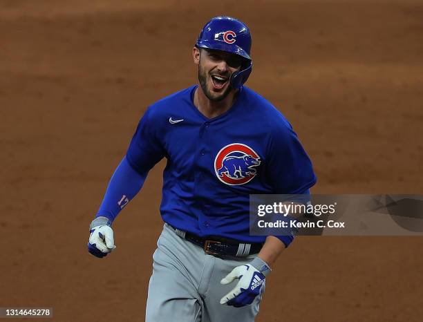 Kris Bryant of the Chicago Cubs rounds second base after hitting a grand slam in the third inning against the Atlanta Braves at Truist Park on April...