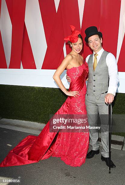 Sarah Hawthorne and Brodie Young at the Mumm marquee during Emirates Stakes Day at Flemington Racecourse on November 5, 2011 in Melbourne, Australia.