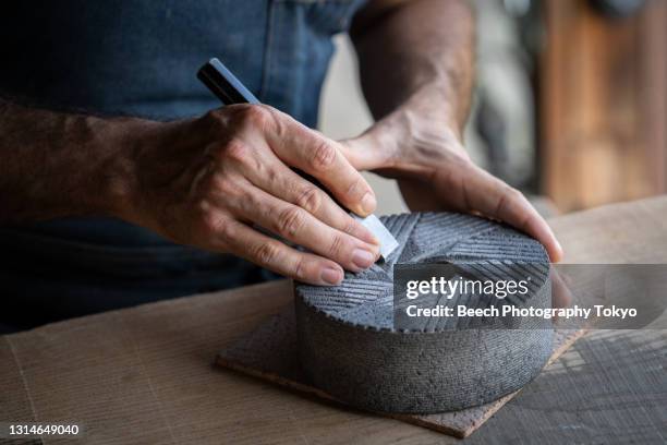 stonemason in his studio - 工芸品 ストックフォトと画像