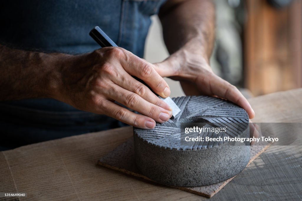 Stonemason in his Studio