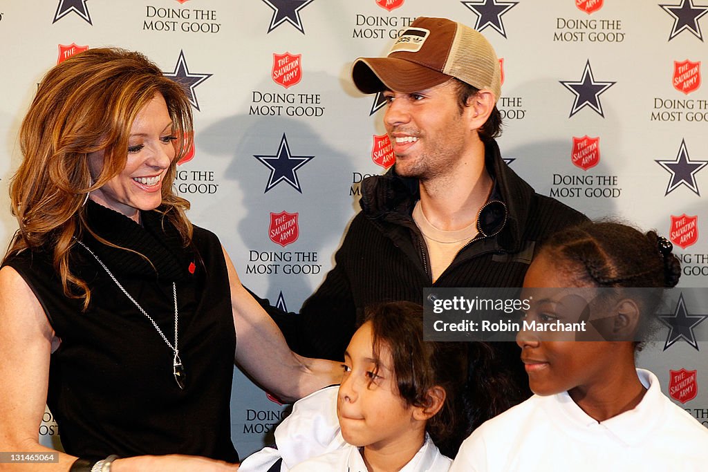 Enrique Iglesias Kicks Off The 120th Anniversary Of The Salvation Army Red Kettle Campaign With The Dallas Cowboys