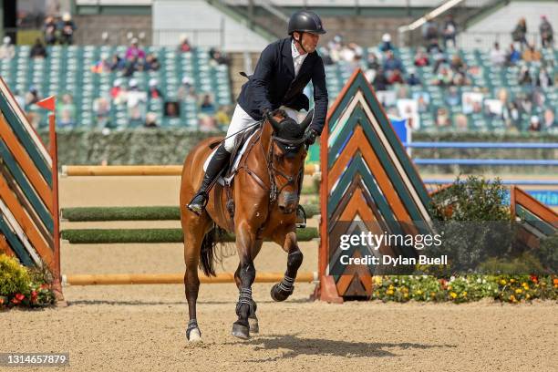 Phillip Dutton atop Z competes during the Stadium Jumping Phase of the Land Rover Kentucky Three-Day Event at Kentucky Horse Park on April 25, 2021...