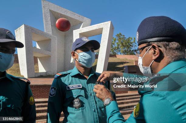 Sylhet, Bangladesh. 1st December 2020. MD Nisharul Arif, Police Commissioner of Sylhet Metropolitan Police pinning a medal on the occasion of the...