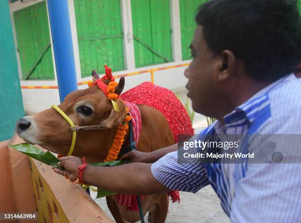 Devotees perform rituals during the Govardhan Puja also called Annakut at a temple at Agartala. Annakut Puja is celebrated with the worshipping of...