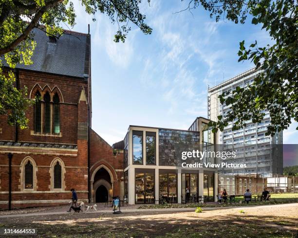 View from north showing outdoor cafe. Grand Junction at St Mary Magdalene's, Paddington, London, United Kingdom. Architect: Dow Jones Architects,...