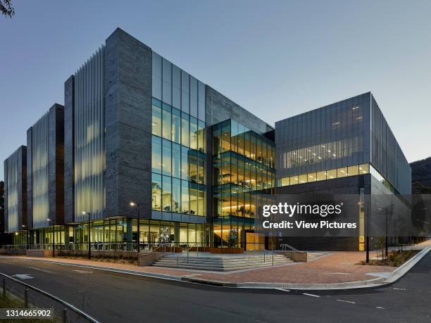 Eastern and northern facades including main entrance and forecourt area. University of Wollongong Western Building, Wollongong, Australia. Architect:...