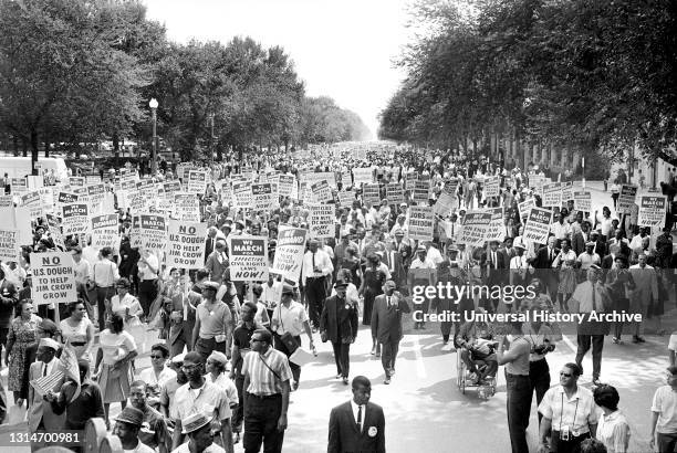 Crowd with Signs at March on Washington for Jobs and Freedom, Washington Monument in Background, Washington, D.C., USA, photo by Warren K. Leffler,...