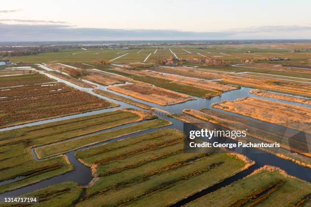 aerial photo of marshland, grassland and open water - zaandam stock pictures, royalty-free photos & images