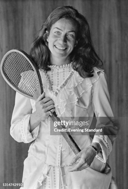 British tennis player Virginia Wade wearing a frilled period-style dress, UK, 17th June 1974.