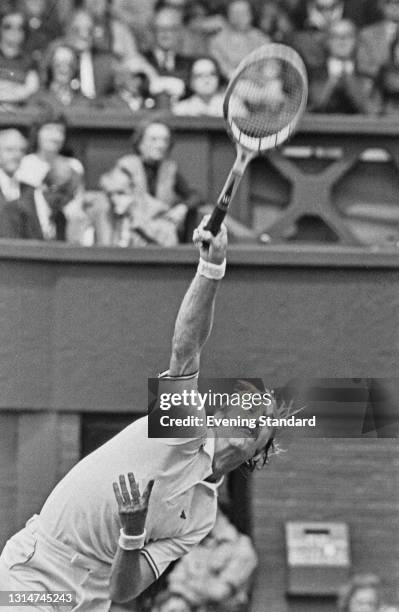 American tennis player Stan Smith during the Wimbledon Championships in London, UK, June 1974. He reached the semifinals of the Men's Singles, but...