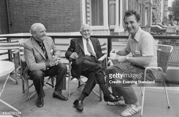 From left to right, Bob Roberts, director of Leeds United FC, Manny Cussins , the club's chairman, and Brian Clough , the club's new manager, UK,...