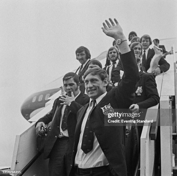 Northern Irish rugby union footballer Willie John McBride leads the British and Irish Lions team from the aircraft upon their return from a tour of...