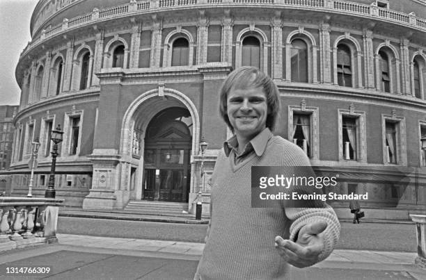 English conductor and singer Patrick McCarthy outside the Royal Albert Hall in London, UK, 8th August 1974. He had stepped in to replace baritone...