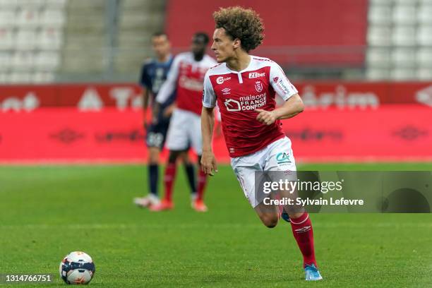 Wout Faes of Stade de Reims in action during the Ligue 1 match between Stade Reims and Olympique Marseille at Stade Auguste Delaune on April 23, 2021...