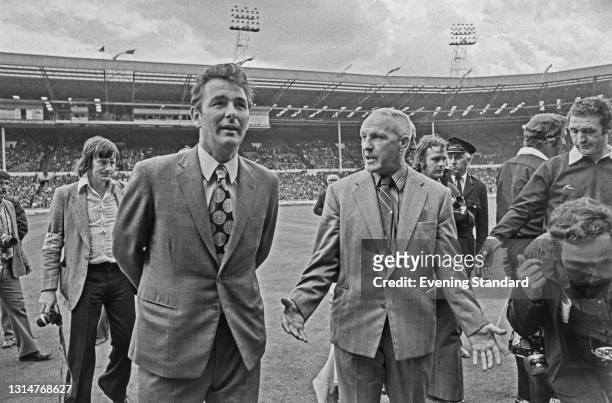 Brian Clough , manager of Leeds United FC, and Bill Shankly , manager of Liverpool FC, during an FA Charity Shield match between the two teams at...