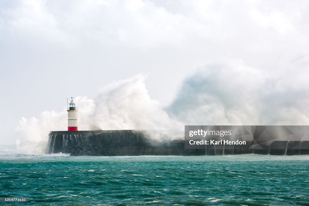 A daytime view of Newhaven Lighthouse in a storm - stock photo