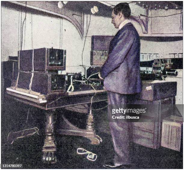 antique photo: marconi and his telegraph radio - guglielmo marconi stock illustrations