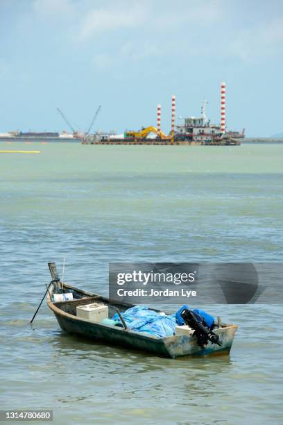 coastal fishermen become victims of reclamation projects - legacy do not correct stock-fotos und bilder