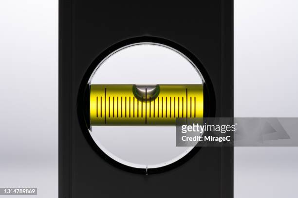 spirit level in silhouette back lit - spirit level stock pictures, royalty-free photos & images