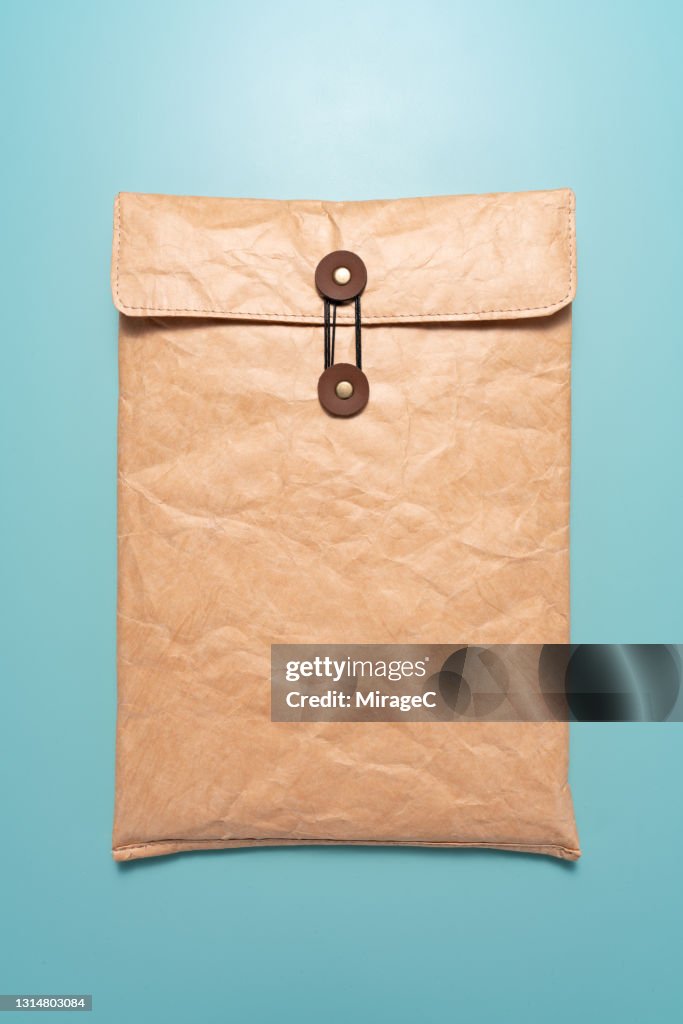 Manila Envelope Sealed with Buttons and String
