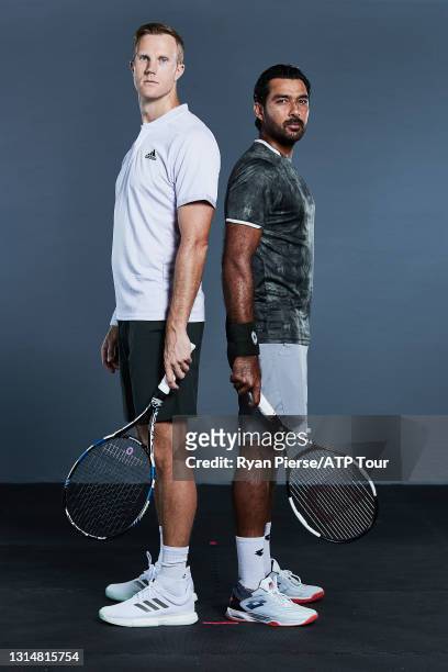 Dominic Inglot of Great Britain and Aisam-Ul-Haq Qureshi of Pakistan pose for a portrait at Melbourne Park on January 19, 2020 in Melbourne,...