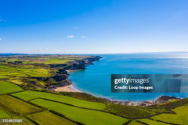 Aerial view of the scenic peninsula of Rhossili bay in Gower in Wales.