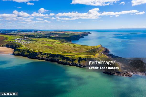 Aerial view of the scenic peninsula of Rhossili bay in Gower in Wales.