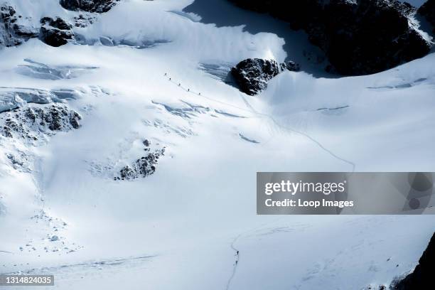 Climbers attempting to climb Fitz Roy mountain.