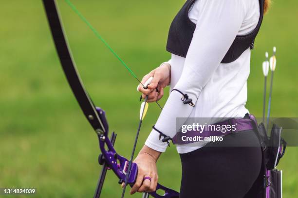 archery training on open field - quiver stock pictures, royalty-free photos & images