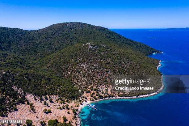 Private and isolated beach in Ithaka in Greece from above.