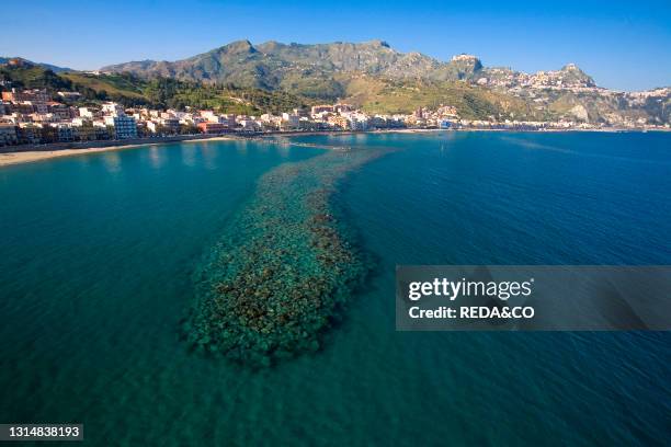 Aerial view of the town and Ionian sea. Giardini Naxos. Messina. Sicily. Italy. Europe.